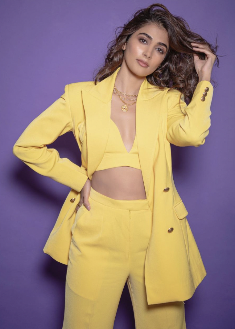 Pooja Hegde in bright yellow bralette and power suit